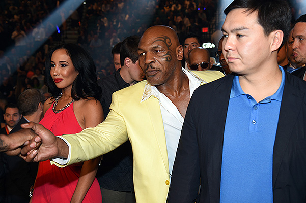 LAS VEGAS, NV - MAY 02:  Mike Tyson shakes hands ringside At "Mayweather VS Pacquiao" presented by SHOWTIME PPV And HBO PPV at MGM Grand Garden Arena on May 2, 2015 in Las Vegas, Nevada.  (Photo by Ethan Miller/Getty Images for SHOWTIME)