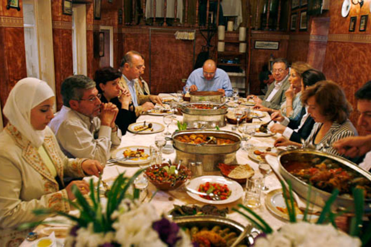 Members of the Syrian Academy of Gastronomy taste Aleppine cuisine at a restaurant in the historic city of Aleppo October 21, 2007. With silk road fame and cosmopolitan prosperity, today's Syrian city of Aleppo was the culinary capital of the Middle East before cultural and commercial decline took its toll. Syria is opening up its economy in the last few years after decades of nationalisation and state control and reviving interest in the city's cuisine. To match feature SYRIA-ALEPPO/CUISINE REUTERS/Khaled al-Hariri (SYRIA)
