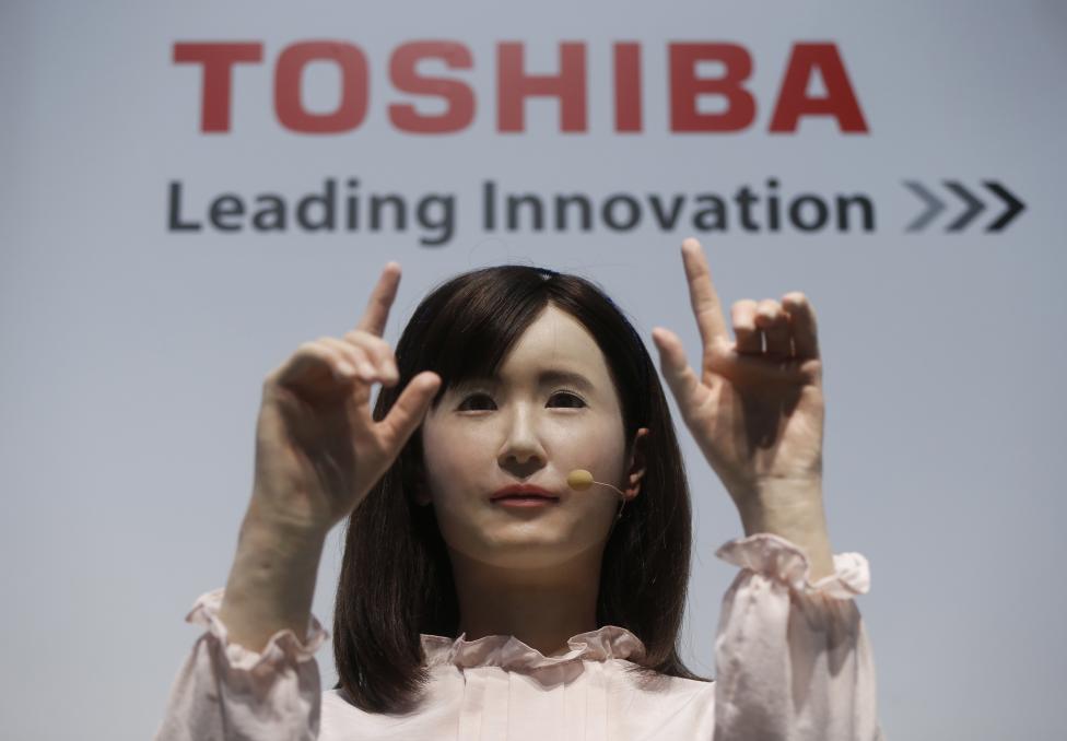 Toshiba Corp. demonstrates its communications android named Ms. Aiko Chihira that can use sign language and introduce itself, Chiba, Japan October 7, 2014. REUTERS/Issei Kato