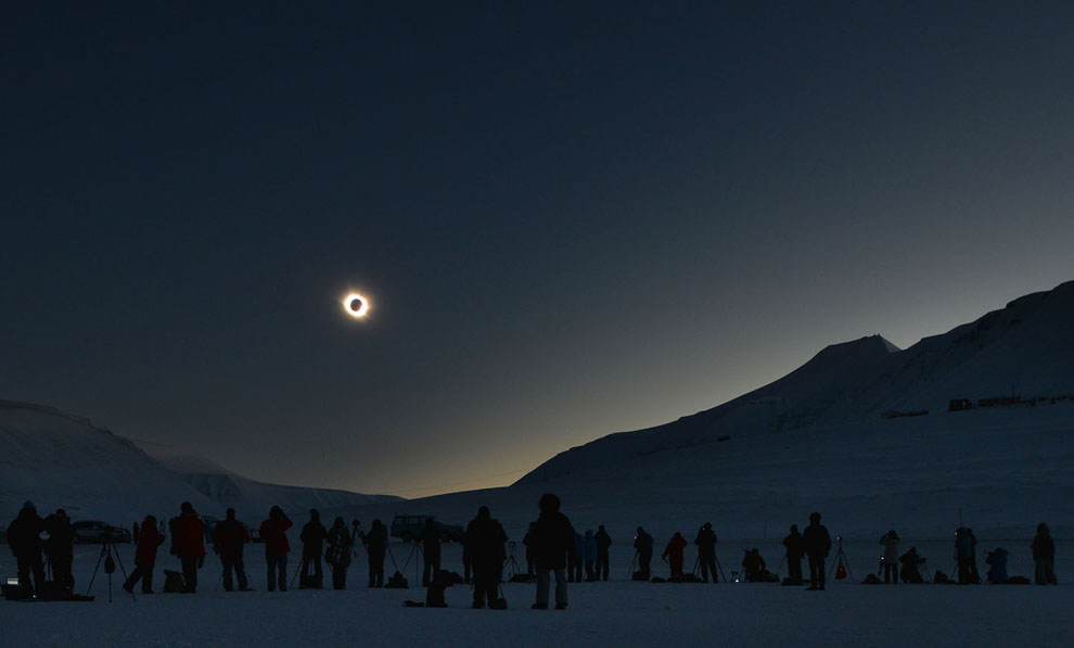 A total solar eclipse as viewed from Longyearbyen, Svalbard, an archipeligo administered by Norway March 20, 2015. Thousands gathering here as the only land the total eclipse will be seen from is on Svalbard and the Faoroe Islands off Iceland. AFP PHOTO/STAN HONDA