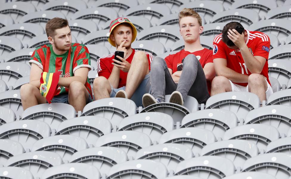 Wales fans react at the end of their match against Wales. REUTERS/Gonzalo Fuentes Livepic